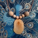 Pendant neckless crafted from Lime and Pine.