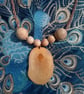 Pendant neckless crafted from Lime and Pine.