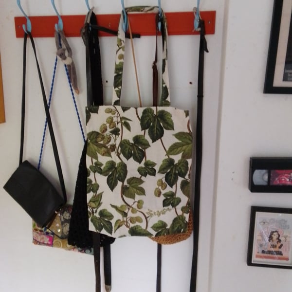 tote bag handmade using a fabric with a large green leaf design