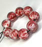 Handmade pink and white patterned lamp work glass beads - Image 6