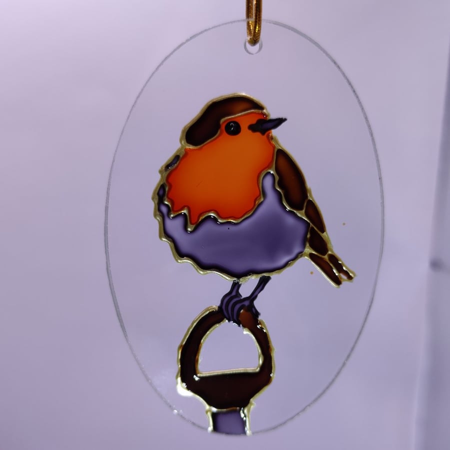 Handmade glass painted window hanging or Christmas tree bauble