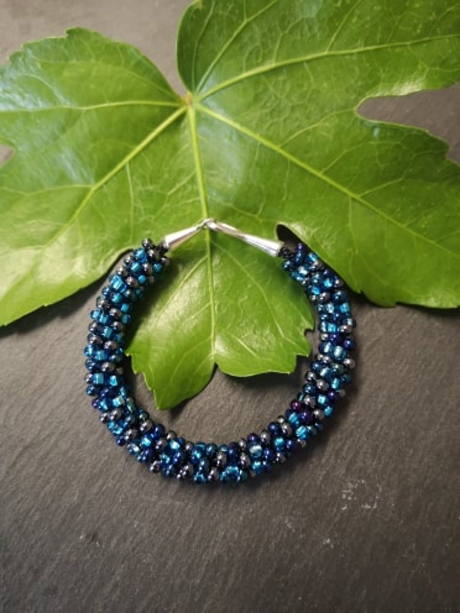Blue beaded bracelet - Kumihimo
