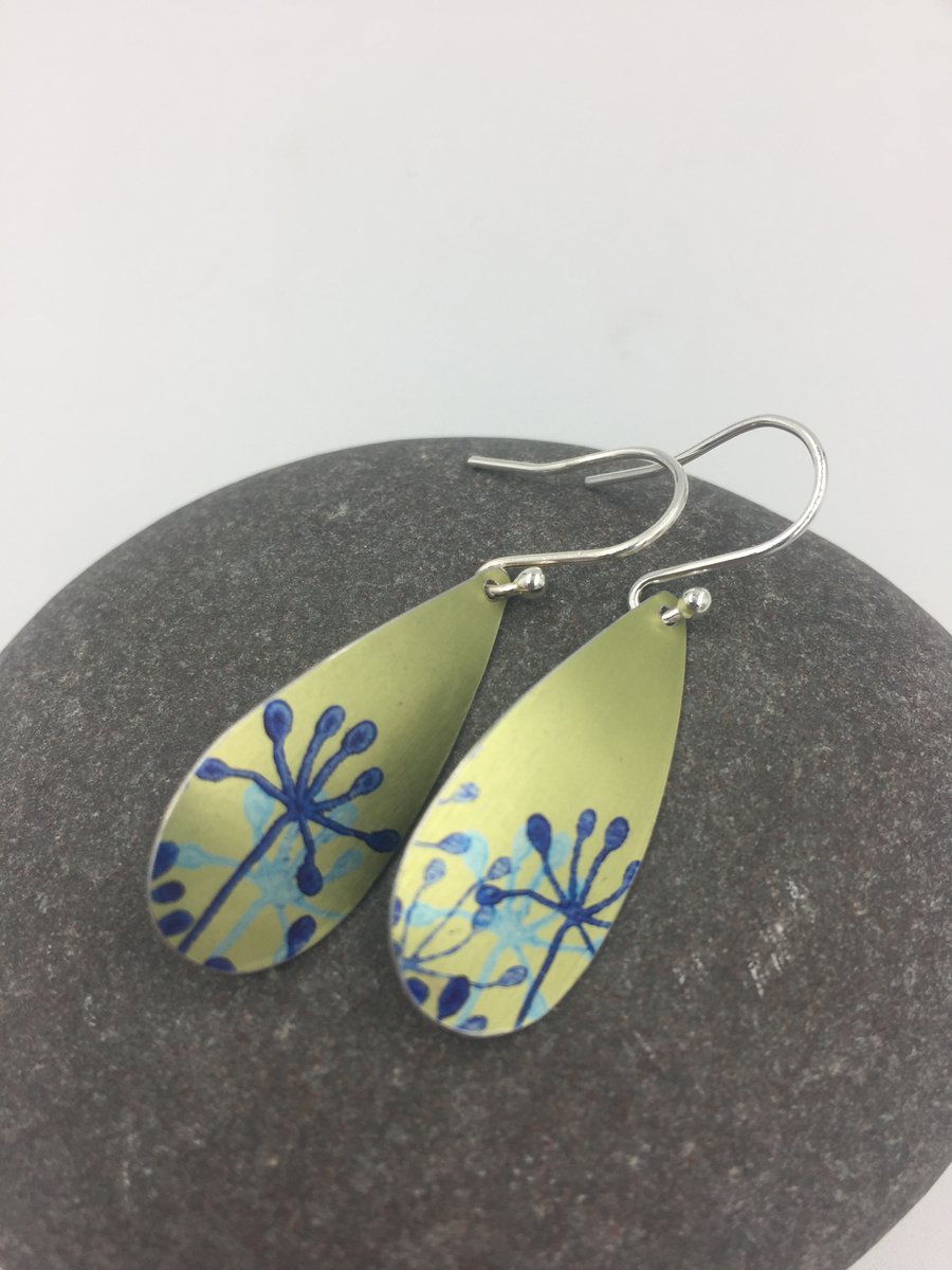 Lime green aluminium cow parsley drop earrings.