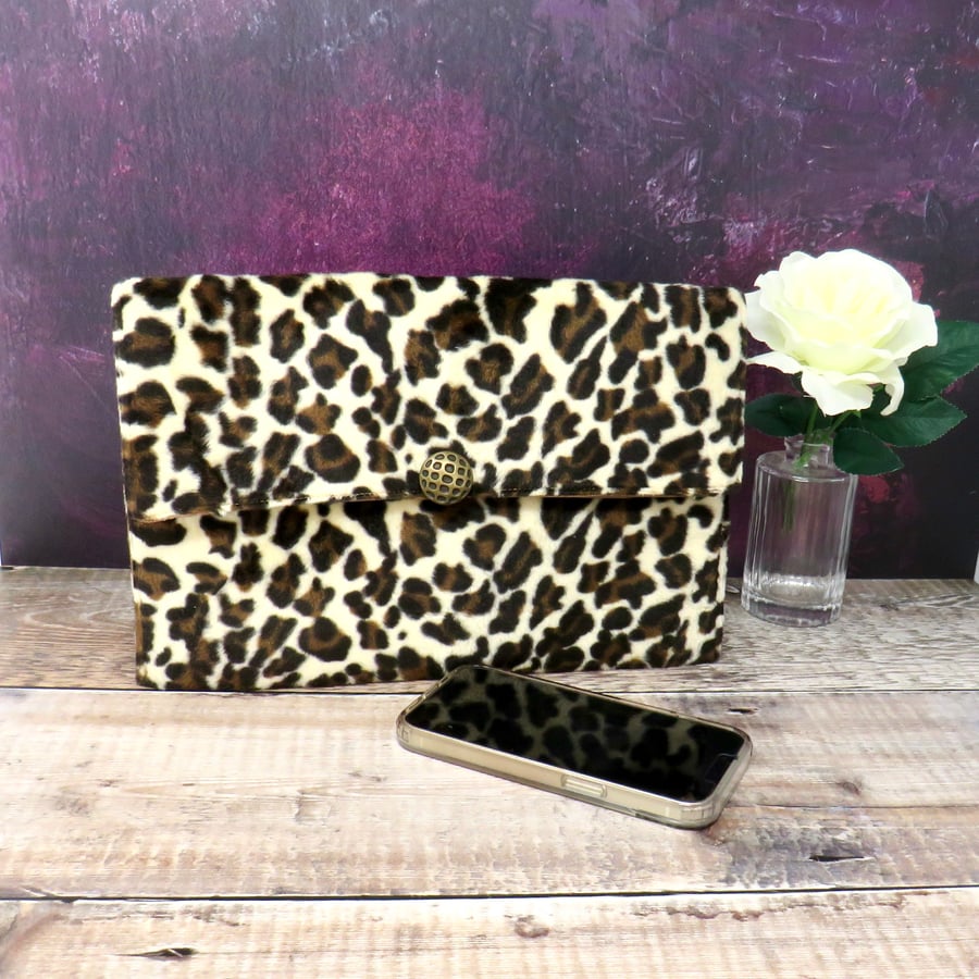 Leopard print faux fur clutch bag