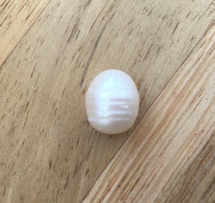 Large Natural Pearl.  A pretty large natural Pearl for a Jewellery Designer.