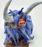 Blue highland cow. Handmade clay cattle 