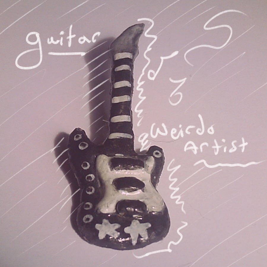 Y2k guitar pin badge