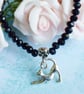 Black Bead Bracelet with Stretching Cat Charm - Image 3