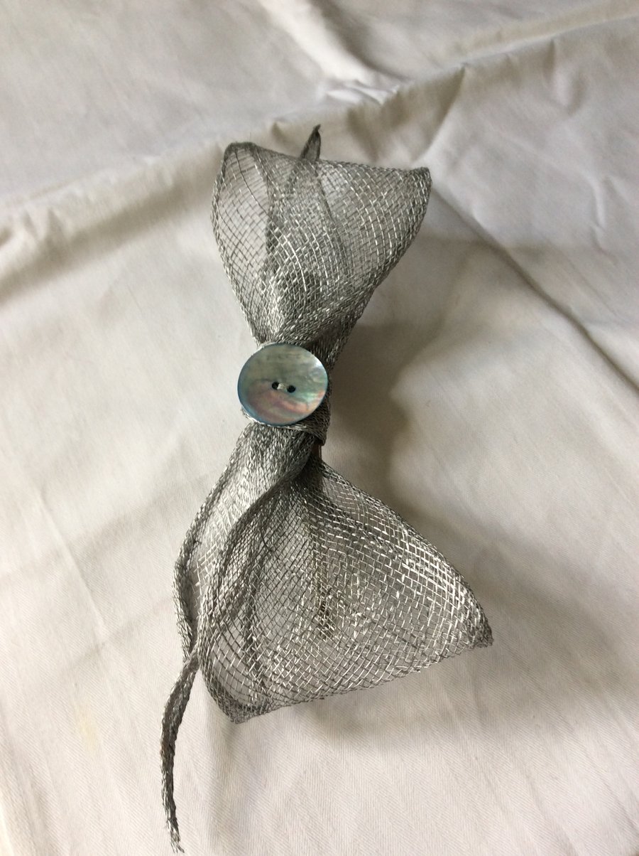 Silver sinamay bow hair clip