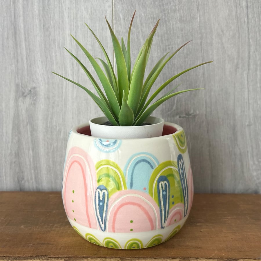 Ceramic hand thrown pot with unique pattern