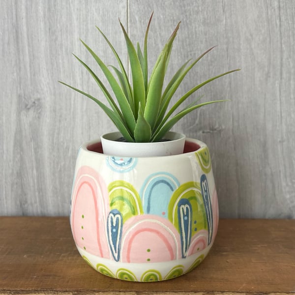 Ceramic hand thrown pot with unique pattern