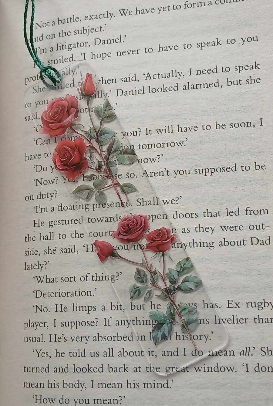 Clear acrylic bookmark decorated with red flowers decals 