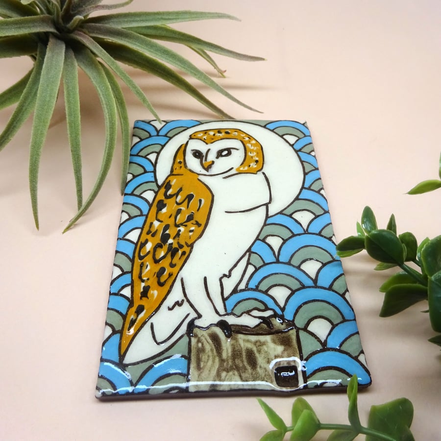 Decorative picture tile of barn owl with moon and geometric background