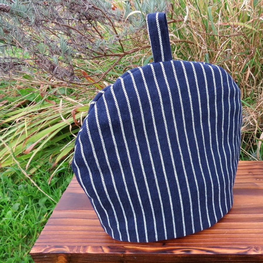 A pinstripe linen teacosy.  A small cosy to fit a 2 cup teapot.