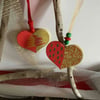 2 Christmas hand painted wooden hearts
