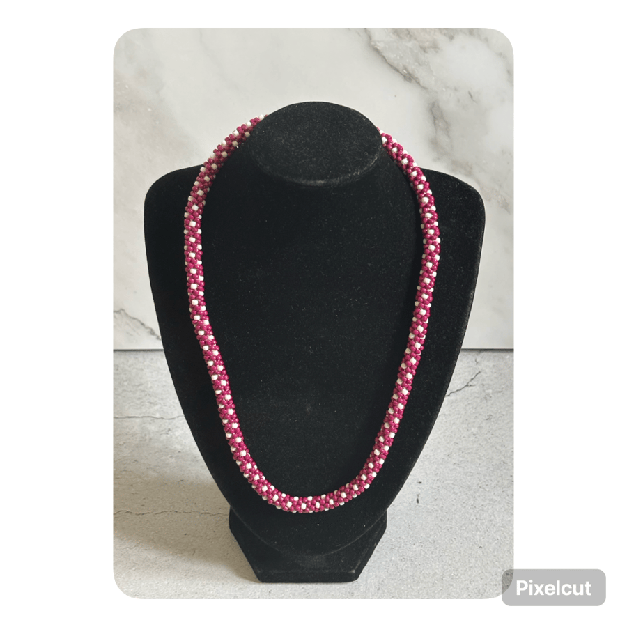 Pink and white Polka dot kumihimo beaded necklace 