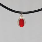 Tiny red sea glass sterling silver pendant