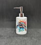 Decoupage ceramic soap dispenser holder with images of a Sea Turtle
