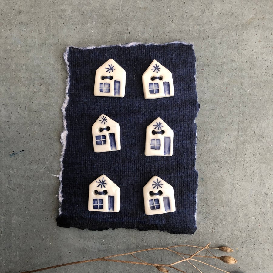 Ceramic house buttons .