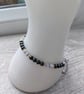 Hematite and mother of pearl bracelet