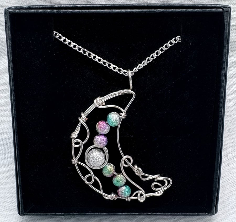 Silver wire wrapped druzy crescent moon