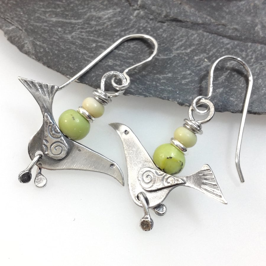 silver song bird earrings with  serpentine and butter jade beads