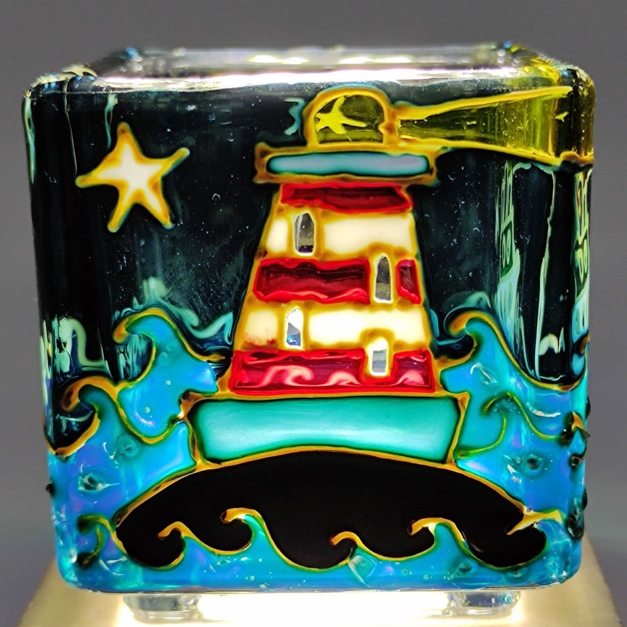 Hand painted glass candle holder, lighthouse and ship in a storm