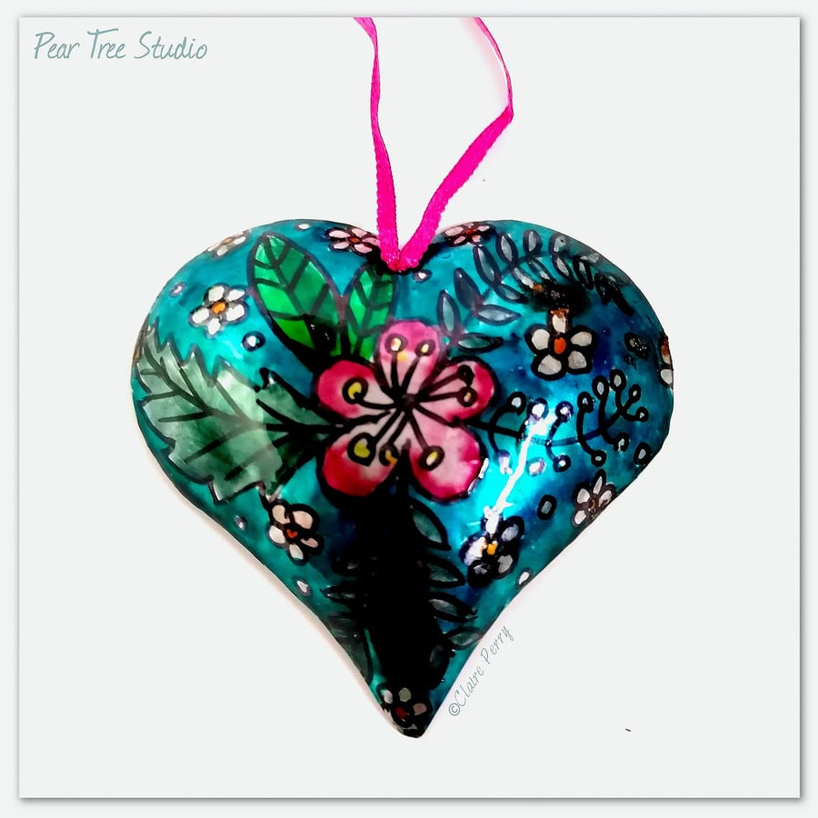 Small turquoise metal heart decoration with a pink flower pattern. Hand made.