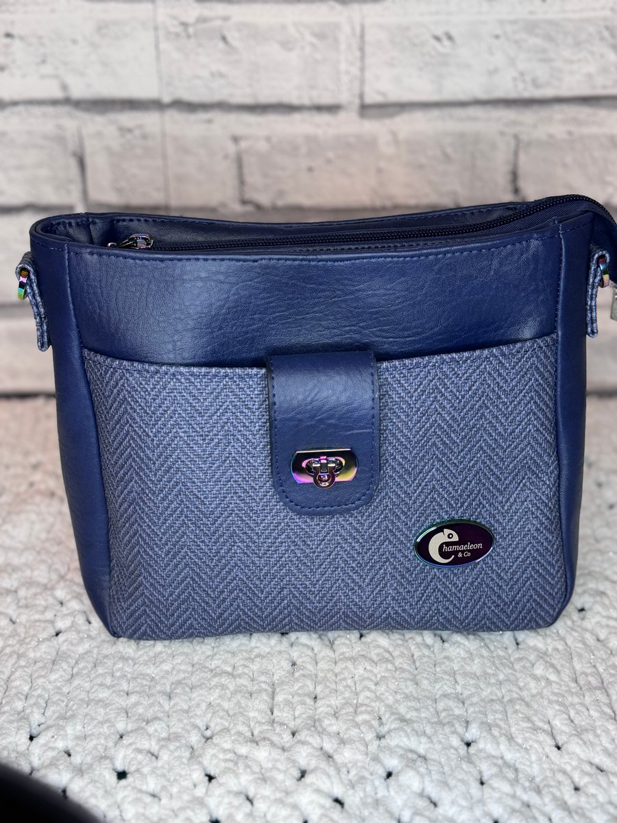 Handbag in Navy and lace faux leather handbag with lots of pockets
