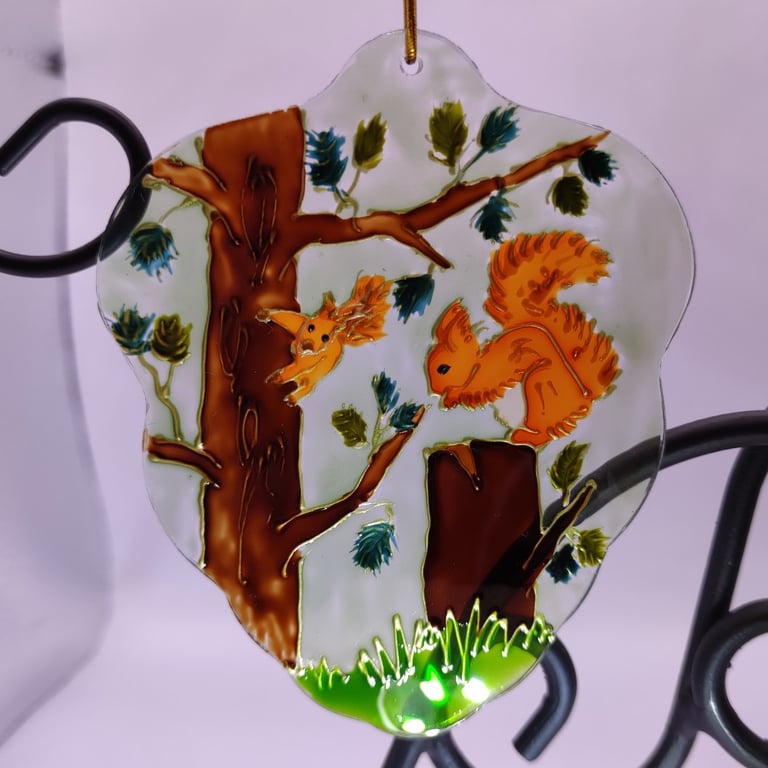 Handmade glass painted window hanging or Christmas tree bauble