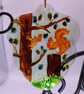 Handmade glass painted window hanging or Christmas tree bauble