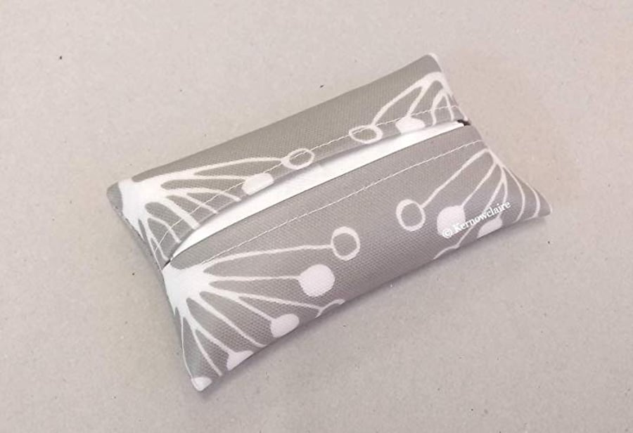 Tissue holder in grey and white, with tissues
