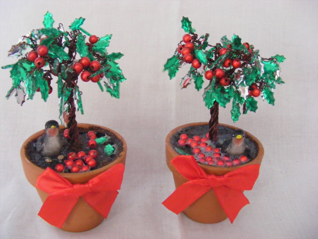 Handmade pair of holly tree decorations.