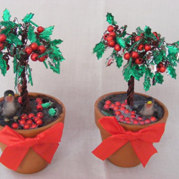 Handmade pair of holly tree decorations.