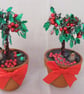 Handmade pair of holly tree decorations. - Image 1