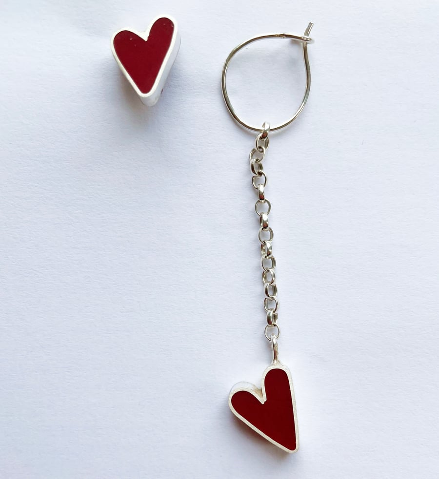 Asymmetrical heart earrings, resin and silver. handmade