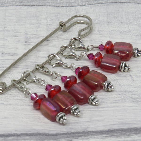 Deep pink stitch markers