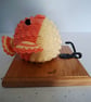 Crocheted puffer fish head on wooden board with hooks - Image 3