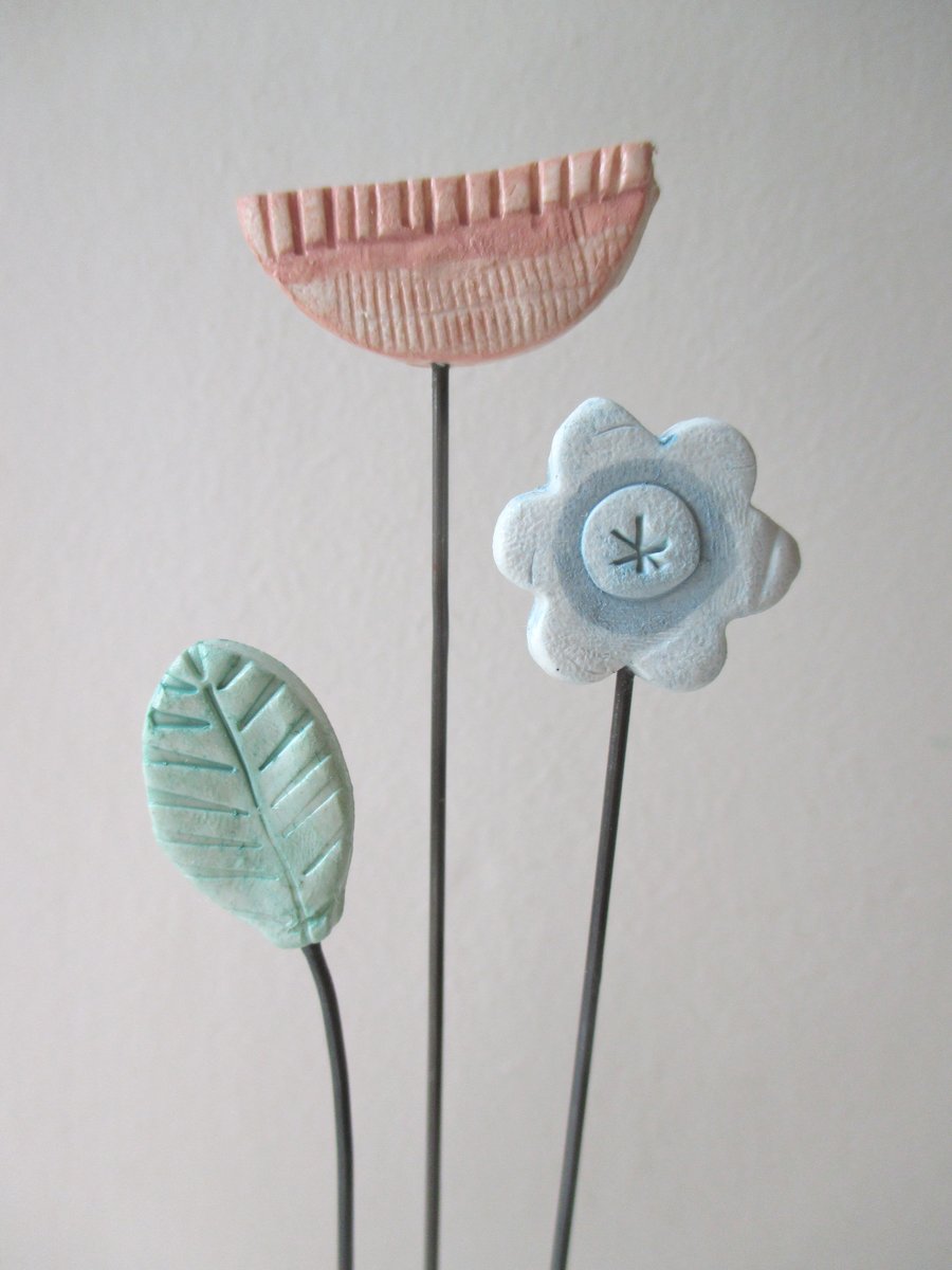 Clay Flowers on a Wooden Block
