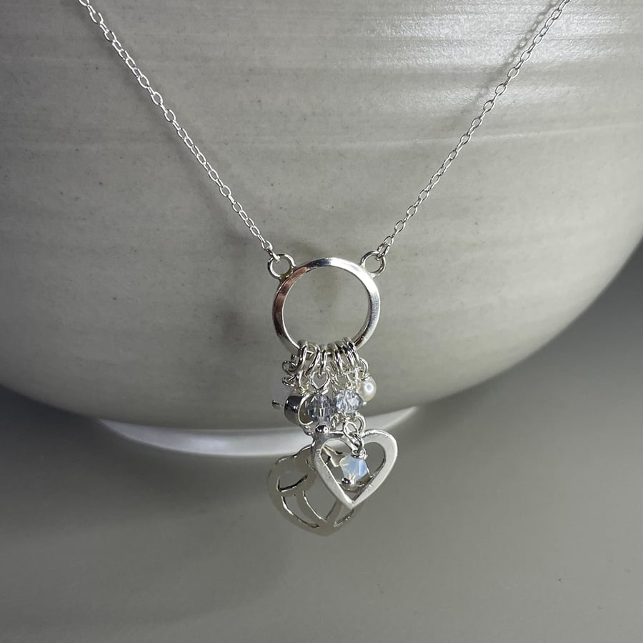 Sterling silver decorative patterned heart cluster necklace