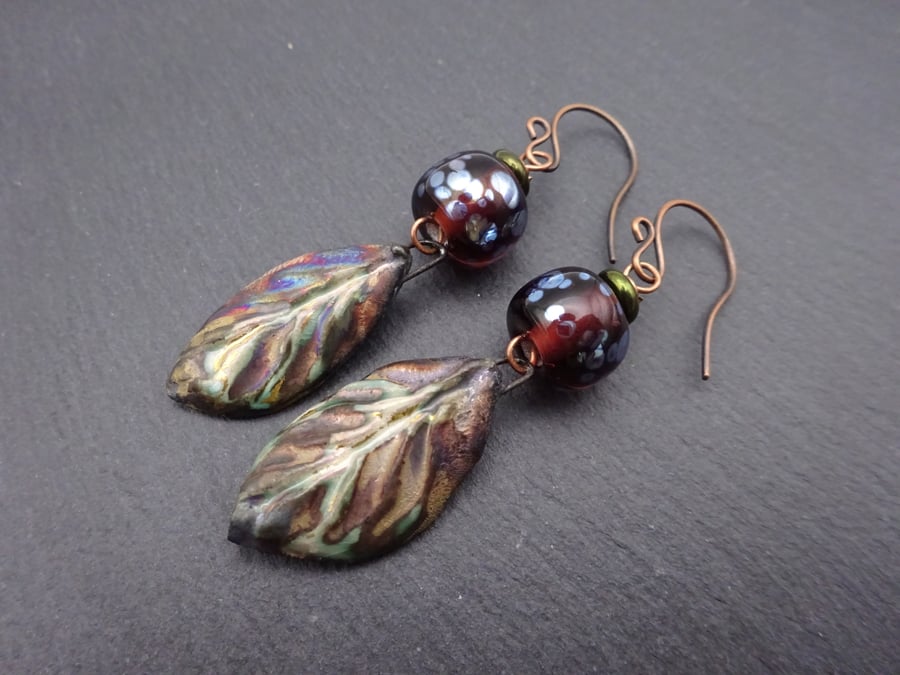 copper earrings, amber lampwork glass and ceramic leaves
