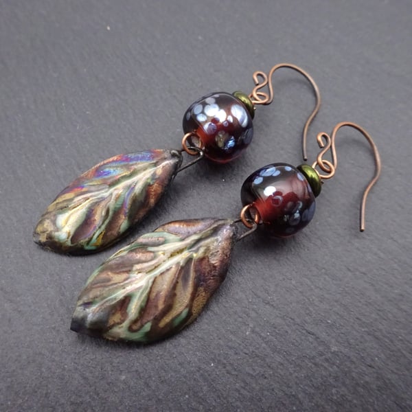copper earrings, amber lampwork glass and ceramic leaves