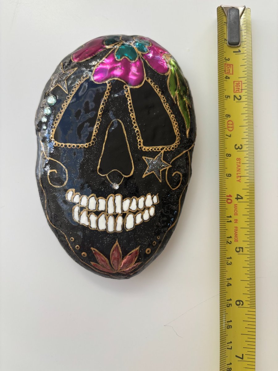 Sugar skull painted rock