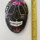 Sugar skull painted rock