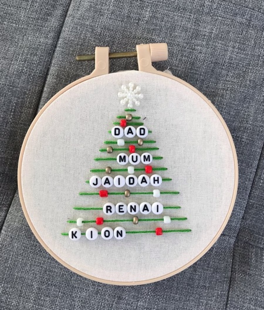 A personalised family Christmas tree ornament 