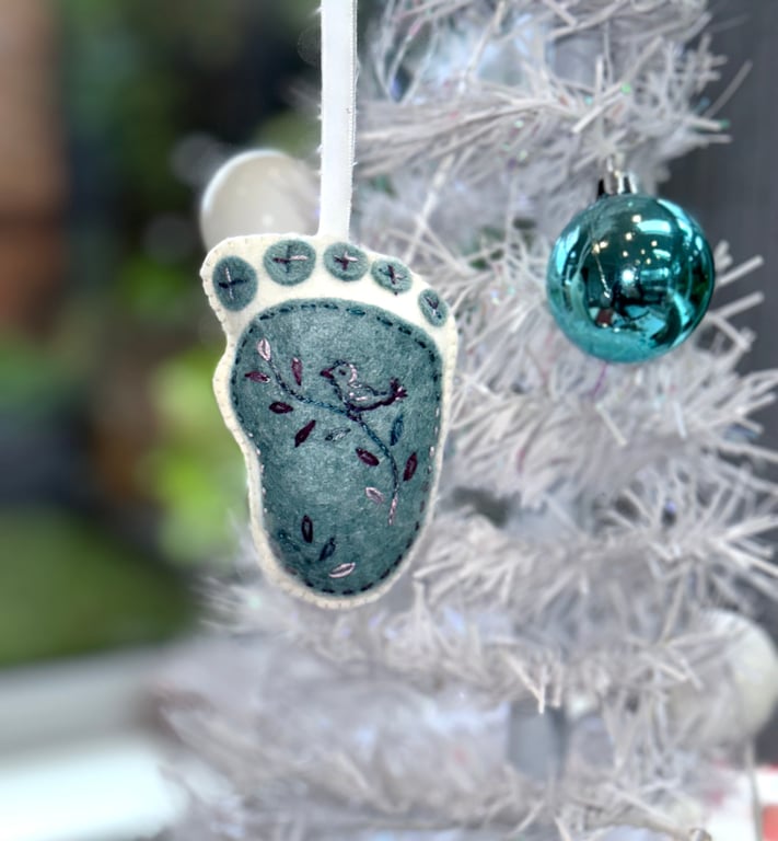 Hanging decoration of a baby footprint - new baby, new parents, christening,   