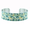 Ocean jewellery bracelet, narrow metal cuff with sea green waves and surf. B127