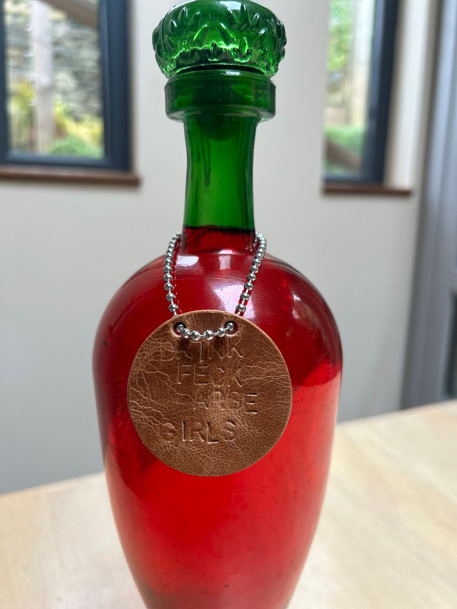 Leather Father Ted quote bottle