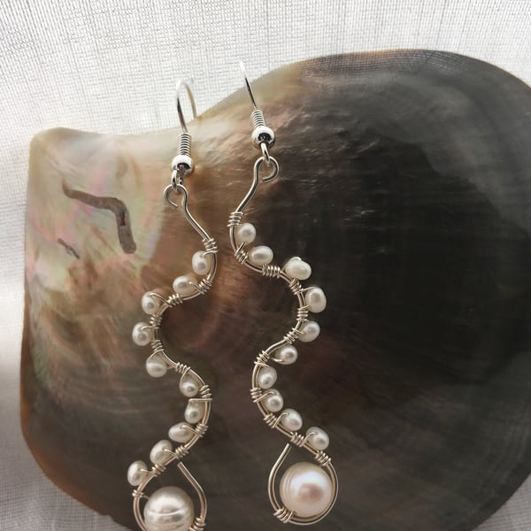 Sinuous freshwater pearl drop earrings - made in Scotland. 