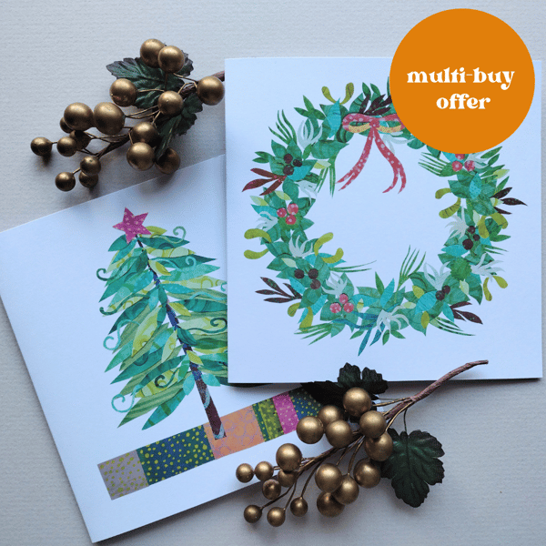 Pack of christmas cards, festive wreath and xmas tree